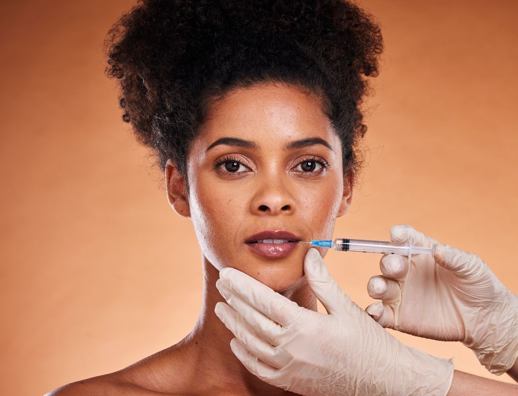 Women about to receive filler injections